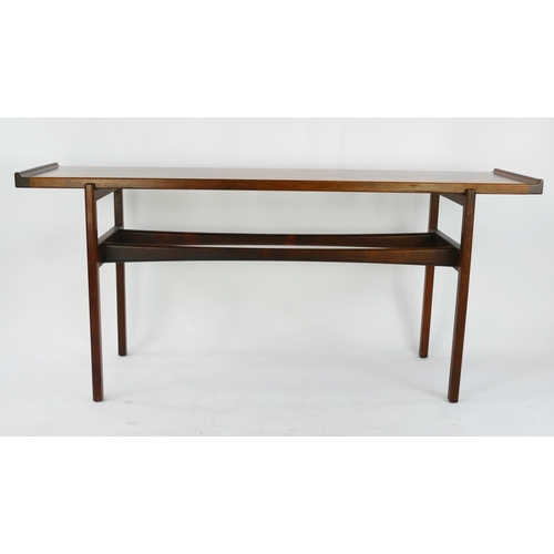 1465 - A Danish rosewood side table by Finn Juhl for Vodder, the rectangular top with swept ends, raised on... 