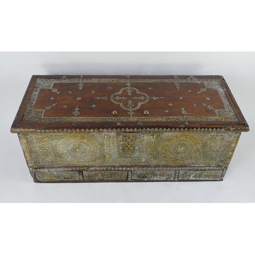 867 - An Antique Zanzibar Chest with four drawers to the base and brass ornamentation, 136(w)x56(d)x54(h)c... 