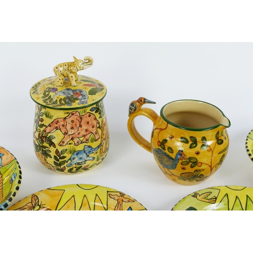 868 - Mhofu of Zimbabwe, A Hand Made Set of Six Bowls and Side Plates with a milk jug and sugar jar