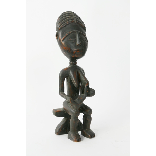 875 - An Asante Carved Wooden Maternity Figure, 29vm