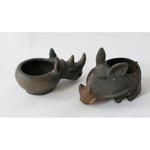 880 - Two African Earthenware Zoomorphic Bowls in the form of a warthog and a rhino, c. 30cm long