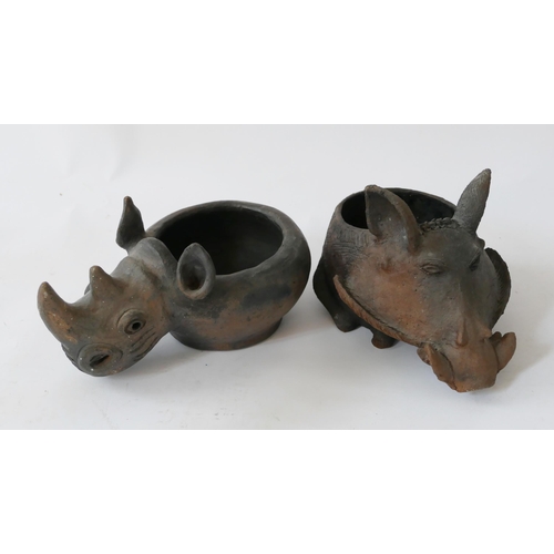 880 - Two African Earthenware Zoomorphic Bowls in the form of a warthog and a rhino, c. 30cm long