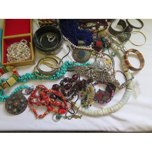 168 - A Large Selection of Ethnic Jewellery, etc.