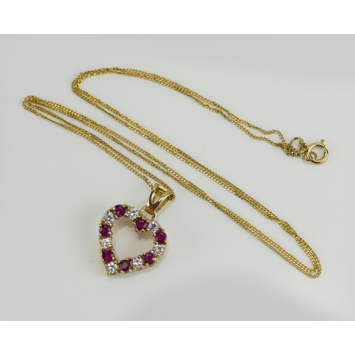 102 - A 9ct Gold, Ruby and White Stone Set Heart Pendant (hallmarked, 20.3mm drop and on a 9ct gold chain ... 