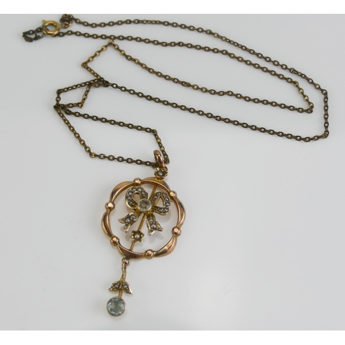 107 - A 9ct Gold, Seed Pearl and Gem Set Pendant (47.1mm drop, 3g) and on a rolled gold chain