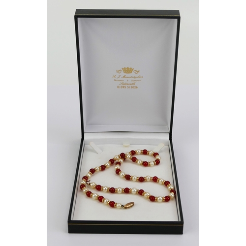 11 - A 9ct Gold, Carnelian and Fresh Water Pearl Necklace, 17.75