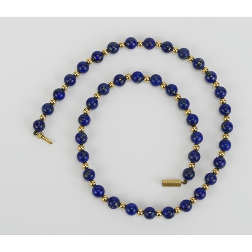 12 - A Precious Yellow Metal and Lapis Lazuli Necklace, 17.25