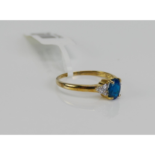 121 - A 9ct Gold, Neon Blue Apatite and White Sapphire Ring, size Q, hallmarked, 1.64g. As new with tag