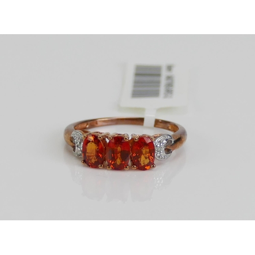 122 - A 9ct Gold, Sunset Ruby and Diamond Ring, size P.75, hallmarked, 2.65g. As new with tag