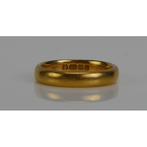 128 - A 22ct Gold Plain Wedding Band, 3.5mm wide, size J.5, Birmingham 1926, 4.61g