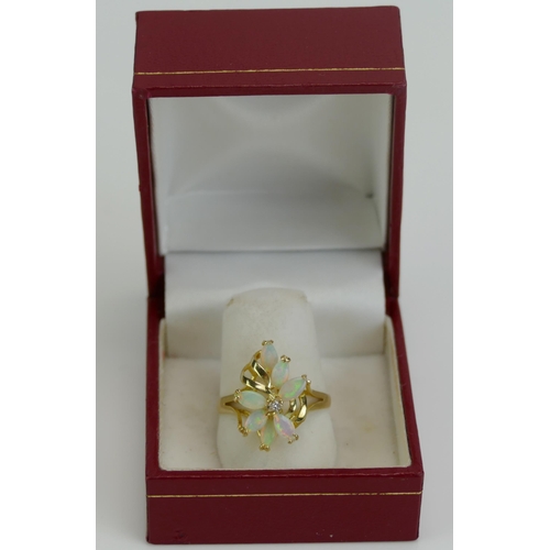 129 - A 14K Gold, Opal and Diamond Ring, size P, stamped 585 14K, 2.39g