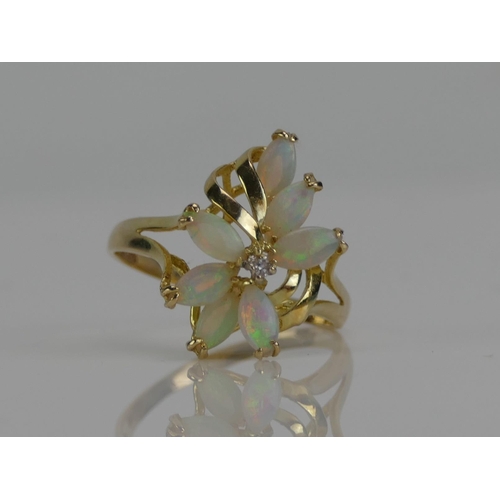 129 - A 14K Gold, Opal and Diamond Ring, size P, stamped 585 14K, 2.39g