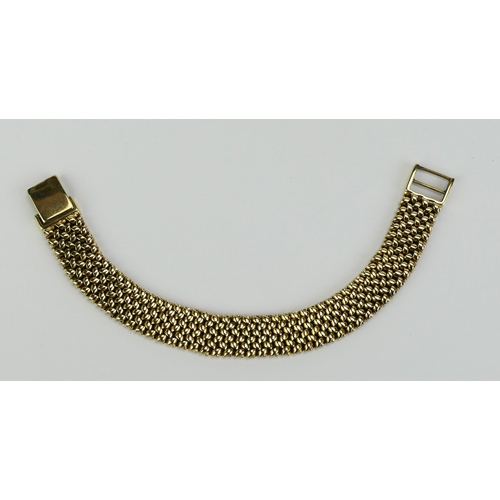 13 - A 9ct Gold 'Herringbone' Bracelet, c. 14.2mm wide, 8