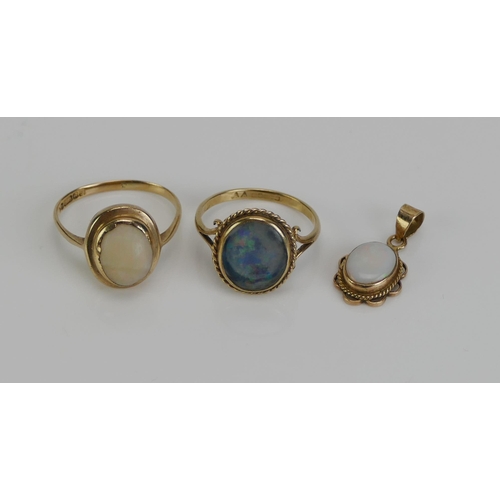 134 - A 9ct Gold and Opal Doublet Ring (size M.5, rubbed marks, 2.13g), another 9ct gold and opal ring (si... 