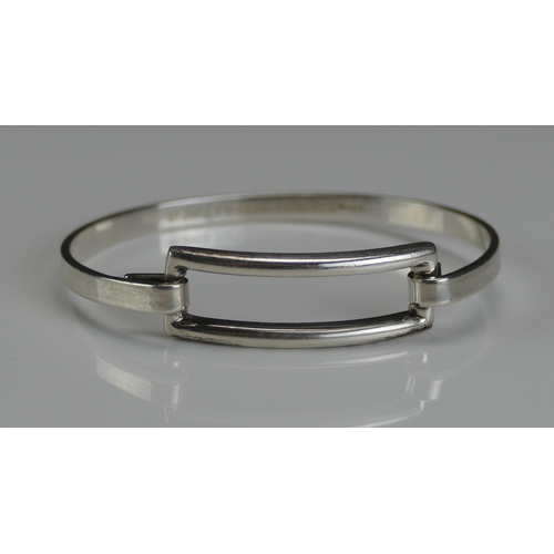 146 - A Tiffany & Co. Silver Bangle, with full marks and hallmarks for London 2004, 15.89g