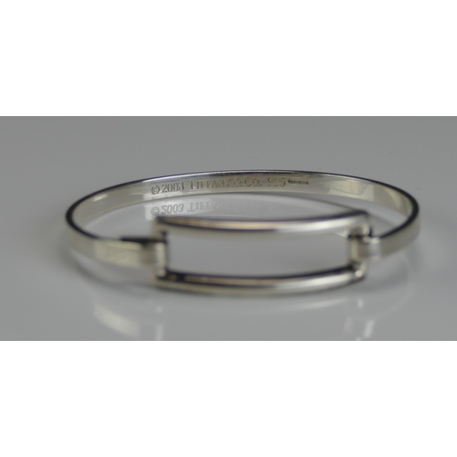 146 - A Tiffany & Co. Silver Bangle, with full marks and hallmarks for London 2004, 15.89g