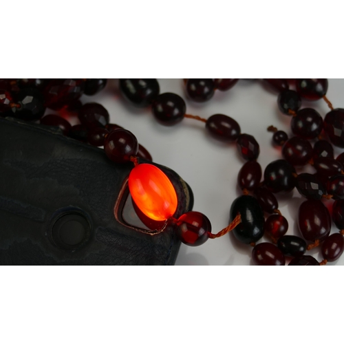 147 - A Selection of Faux Cherry Amber, largest bead 24.4x18.8mm, 126g