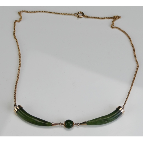 152 - A Nephrite Necklace in a gilt metal setting