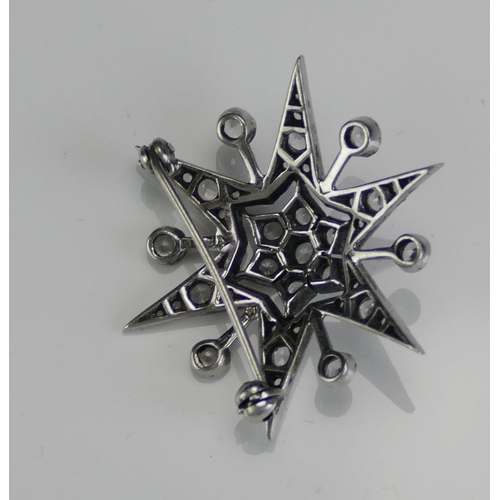 157 - A Silver and Paste Star Brooch, 35.2mm diam. 5.81g