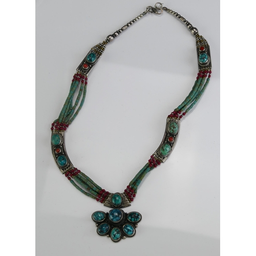 165 - A Navajo White Metal and Turquoise Necklace. End near clasp need attention