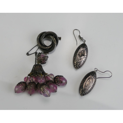 168 - An Antique White Metal Brooch and a pair of earrings