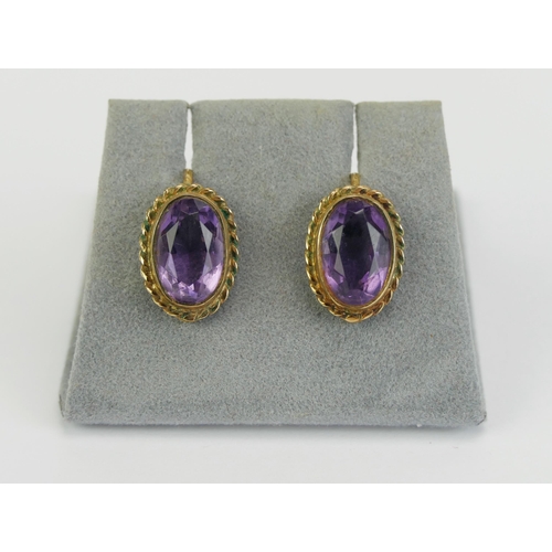 19 - A Pair of 9ct Gold and Amethyst Screw Back earrings, 12.9x9.3mm heads, stamped 9CT, 3.13g