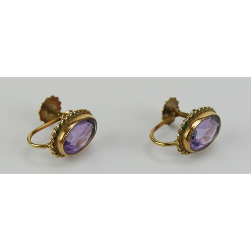 19 - A Pair of 9ct Gold and Amethyst Screw Back earrings, 12.9x9.3mm heads, stamped 9CT, 3.13g