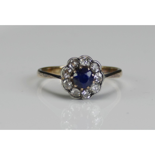 204 - An Antique 18ct Gold, Sapphire and Diamond Cluster Ring, c. 4.36mm principal stone surrounded by eig... 