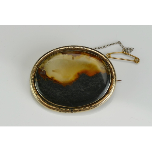 211 - A 19th Century Agate Brooch in a precious yellow metal mount, 41.8x33mm, KEE tests as 9ct, 7.37g.  U... 