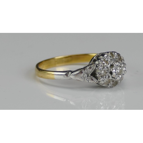 237 - An 18ct Gold and Diamond Cluster Ring, 8mm platinum set head, size L, rubbed marks, 3.18g