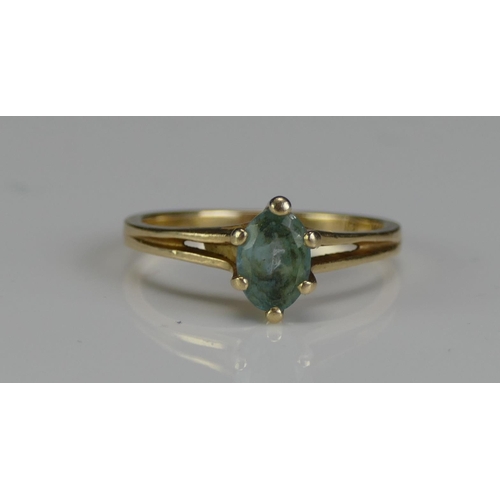 241 - A 14K Gold and Blue Topaz Dress Ring, size L, stamped 14K, 2.32g