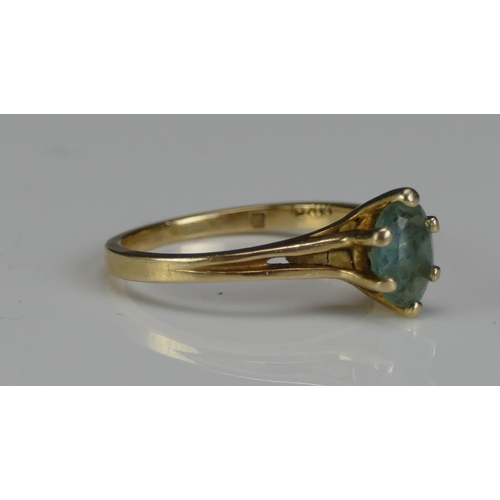 241 - A 14K Gold and Blue Topaz Dress Ring, size L, stamped 14K, 2.32g