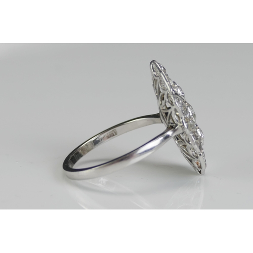 242 - An Art Deco18ct White Gold and Diamond Plaque Ring, c. 4.25x4mm largest old cut millegrain set, size... 