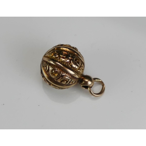 249 - An Antique Precious Yellow Metal Ball Pendant with embossed decoration, 19.4mm drop, KEE tests as 9c... 