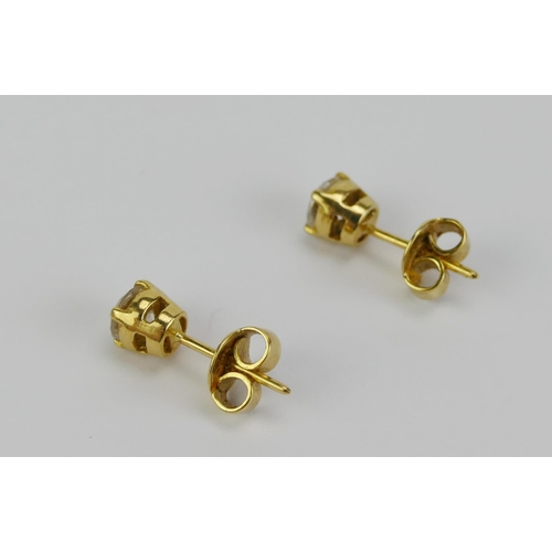 26 - A Pair of 18KT Gold and Diamond Stud Earrings, c. 4.55mm brilliant round cut stones, butterflies sta... 