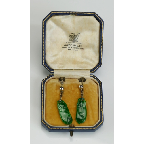 267 - A Pair of Jadeite and White Metal Screw Back Earrings in a Hardy Bros. Ltd. of Australia fitted box,... 