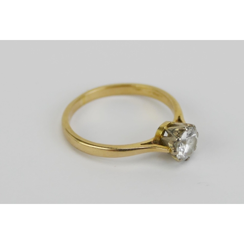 33 - An 18ct Gold and Diamond Solitaire Ring, c. 6.1mm brilliant round cut claw set stone, size Q, stampe... 