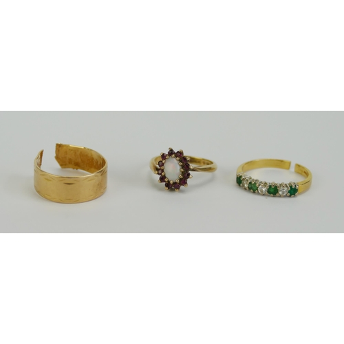 34 - A Cut 18ct Gold, Emerald and Diamond Ring (3.12g), a bent 9ct gold opal and ruby cluster ring (2.37g... 