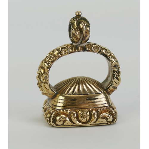 40 - A 19th Century Yellow Metal and Carnelian Fob Seal decorated with an armorial and Latin motto 