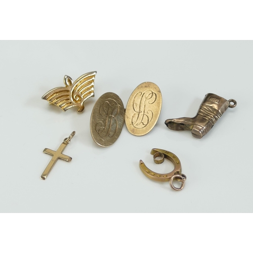 44 - A 9ct Gold Cross Pendant, 9ct gold horseshoe and boot charms, 9ct gold cufflink, etc., 6.21g