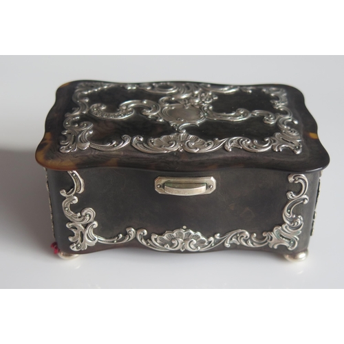 532 - A continental tortoiseshell and silver mounted trinket box, bears import marks for London, 1897, of ... 