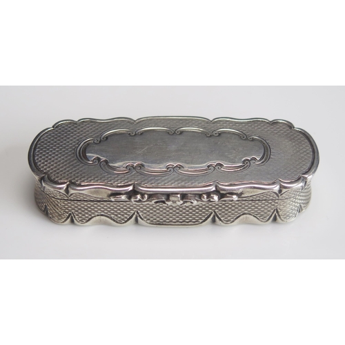 543 - A Victorian silver snuff box, maker Edward Smith, Birmingham, 1856, of oval form with engine turned ... 