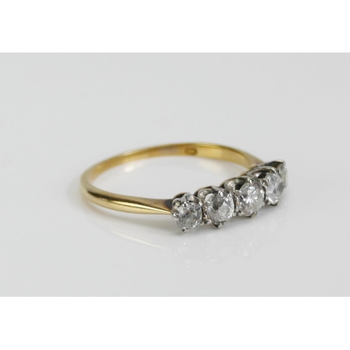 61 - An Old Cut Diamond Five Stone Ring in a precious yellow and white gold setting, c. 3.9mm principal s... 