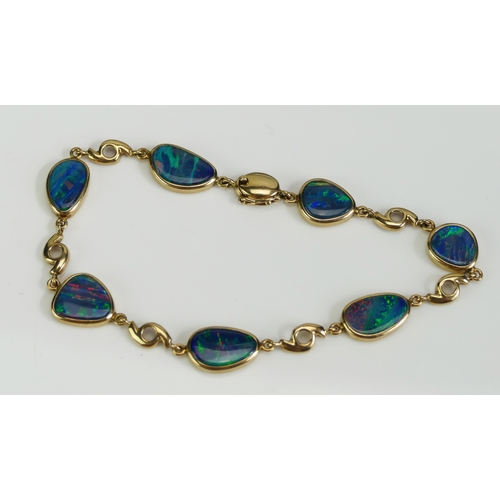 63 - A 9K Fold and Doublet Opal Bracelet, 7.5