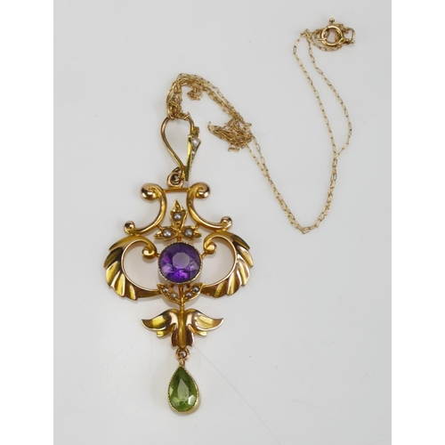 64 - A Suffragette 15ct Gold, Peridot, Amethyst and Seed Pearl Pendant on a tangled 14K gold chain, 51.3m... 