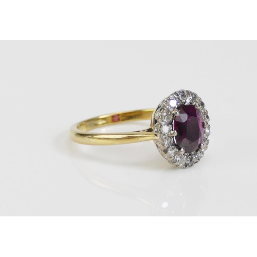 65 - An 18ct Gold, Ruby and Old Cut Diamond Cluster Ring, 7.4x6.5mm principal stone, 12.4x11.1mm head, si... 