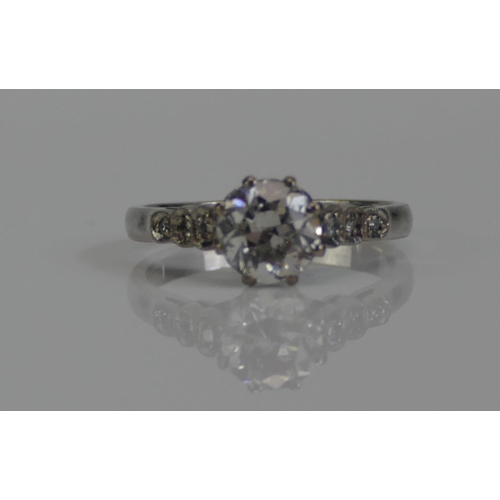 69 - An 18ct White Gold and Diamond Single Stone Ring with three millegrain set to each shoulder, 6.4mm p... 