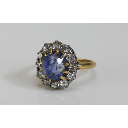 71 - An 18ct Gold, Sapphire and Old Cut Diamond Cluster Ring, 16.1x14.4mm head, size L, stamped 18CT, 7.5... 