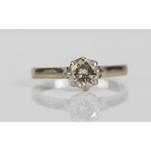 73 - An 18ct White Gold and Diamond Solitaire Ring, c. 5.8mm brilliant round cut, size N, hallmarked, 2.1... 