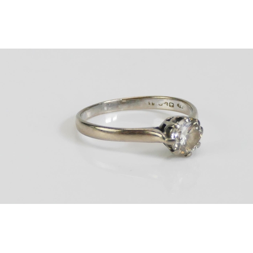 73 - An 18ct White Gold and Diamond Solitaire Ring, c. 5.8mm brilliant round cut, size N, hallmarked, 2.1... 